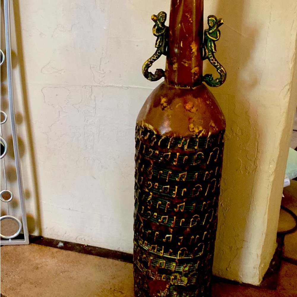 Intricate details on this vase. Beautiful addition to any home.